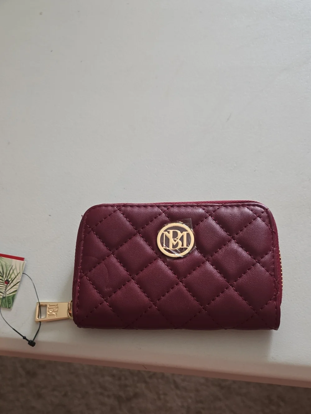 Badgley Mischka Quilted Wine Zip Card Wallet with Gold Logo
